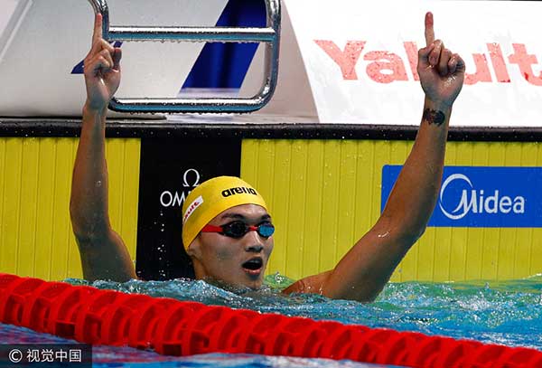 Tough overseas training pays off for golden swimmers