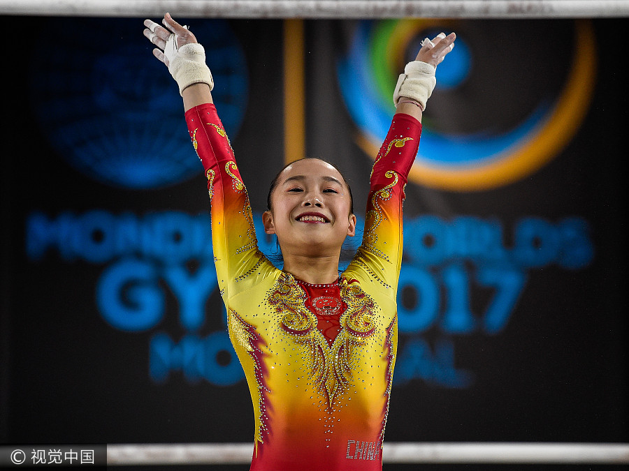 China's Fan defends uneven bars title at gymnastics worlds in Montreal