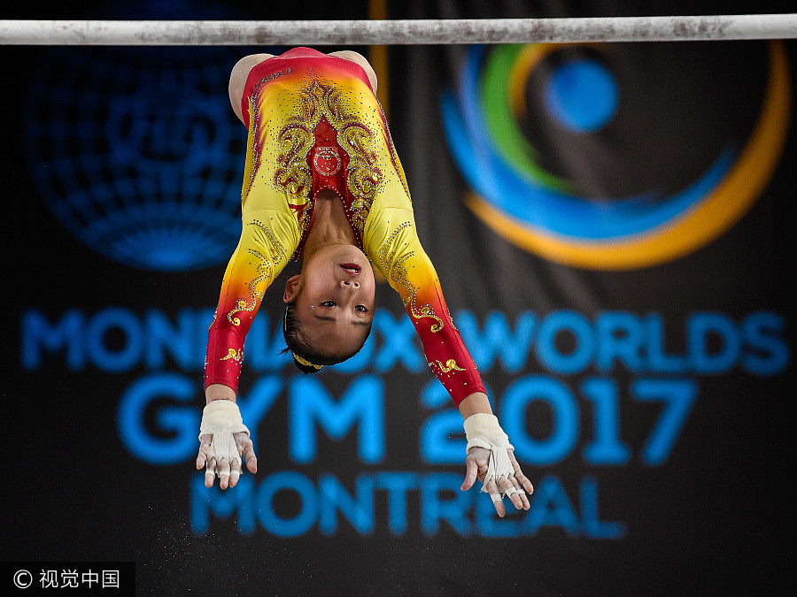 China's Fan defends uneven bars title at gymnastics worlds in Montreal