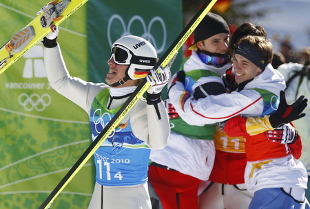 Austria wins team ski jump gold at Olympics