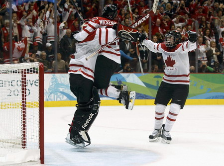Canada beats US for a third straight women's ice hockey title