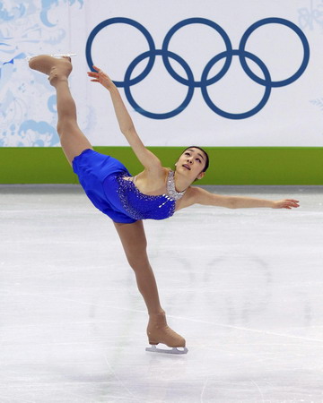 S.Korean Kim wins figure skating gold with record score