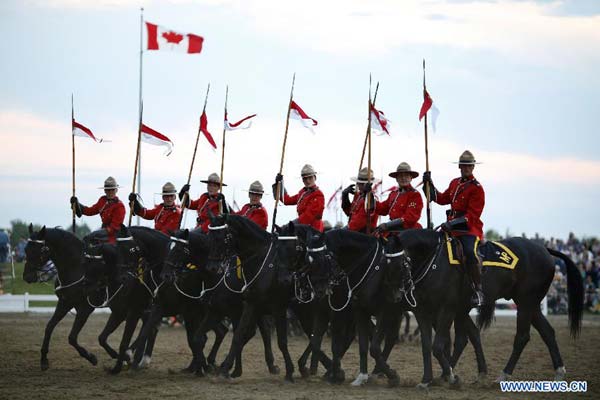 RCMP feast tourists with performances at Sunset Ceremonies in Canada
