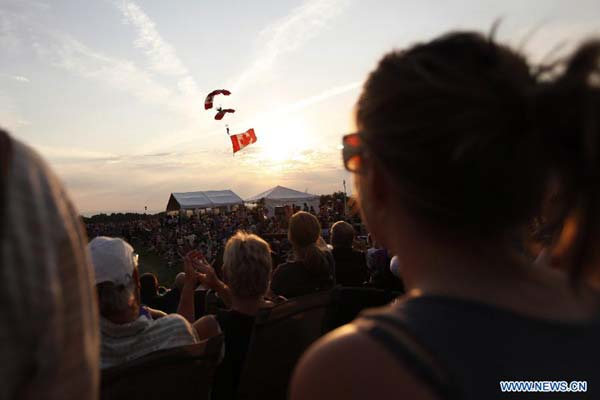 RCMP feast tourists with performances at Sunset Ceremonies in Canada