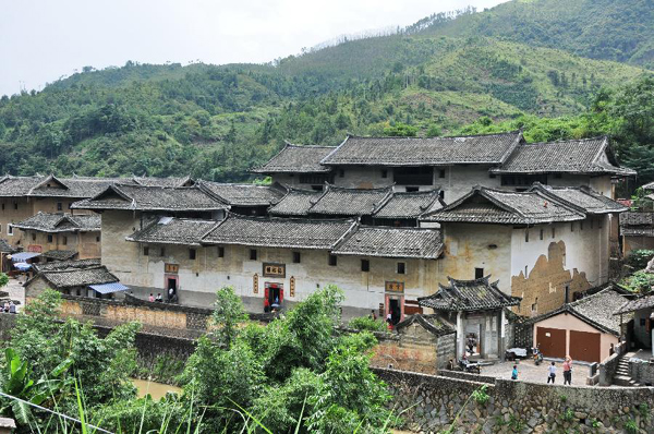 Tourists visit Tulous in Yongding, China's Fujian