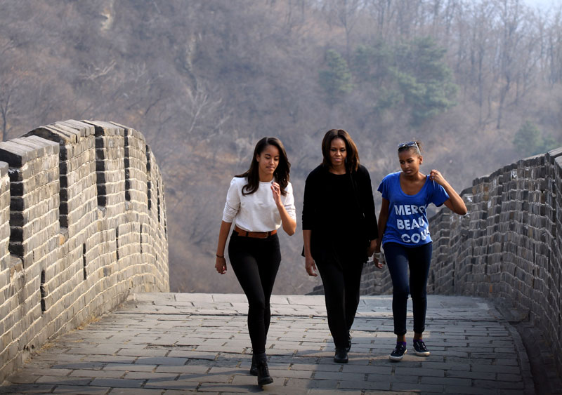 Obamas climb Great Wall after lunch of trout
