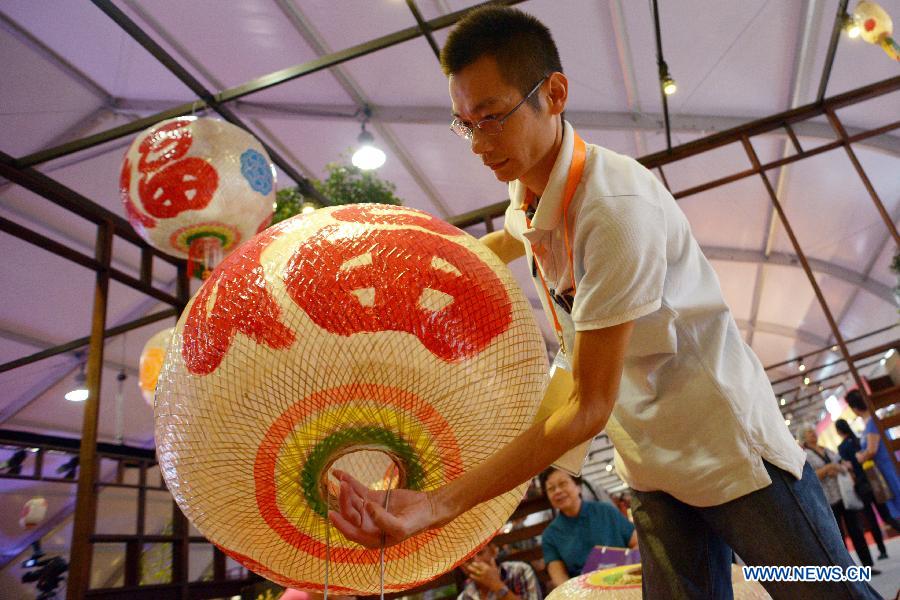 Chinese craftsmen show lanterns for Singapore's Teochew Festival