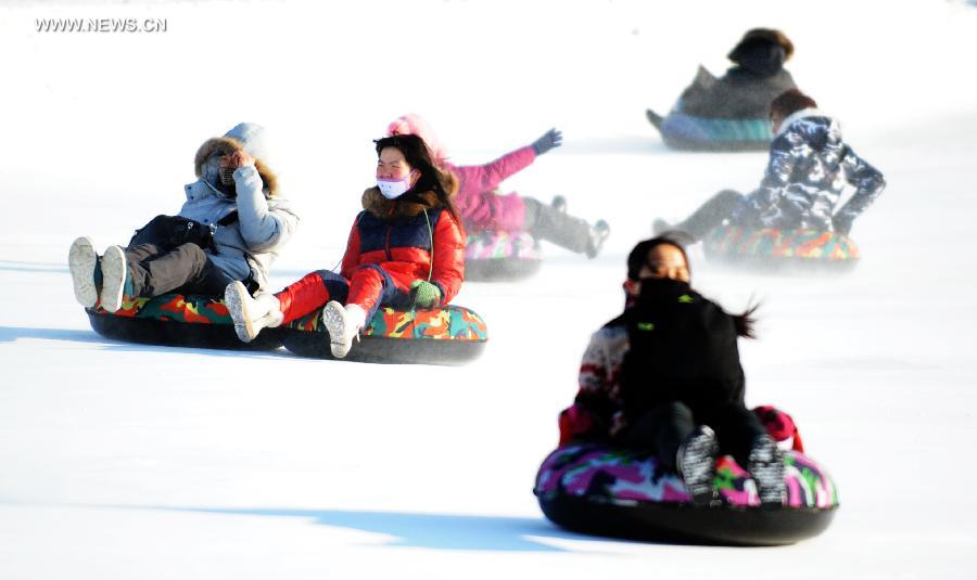 People celebrate New Year on frozen river