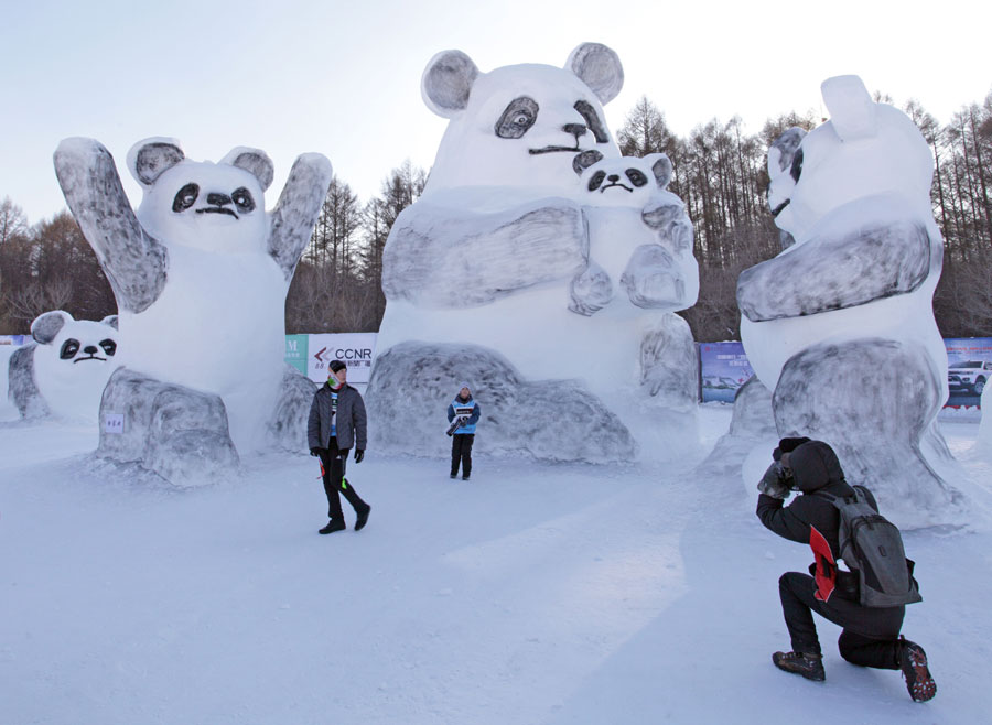 Panda snow sculptures attract tourists in Changchun