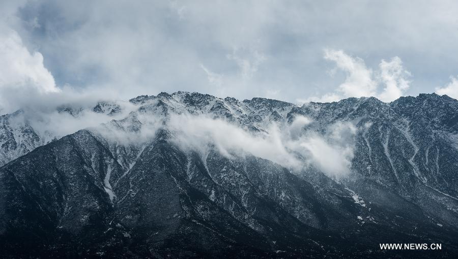 Snow cloak Qunjia National Forest Park as winter falls