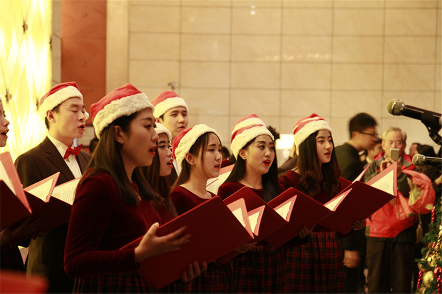 Beijing gets into Christmas spirit with illuminated trees, carols and the smell of cinnamon