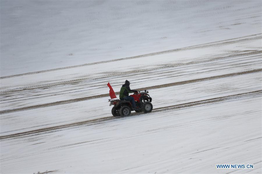 Dunhuang sees first snowfall this winter