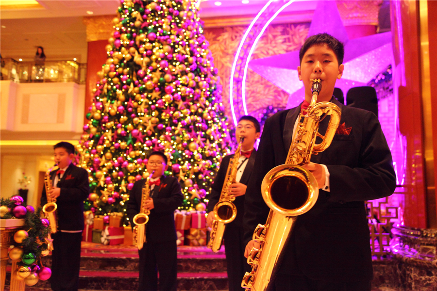 Beijing gets into Christmas spirit with illuminated trees, carols and the smell of cinnamon