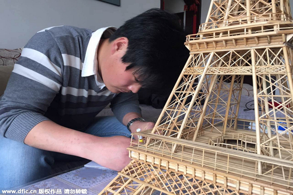 Bamboo Eiffel Tower built for girlfriend