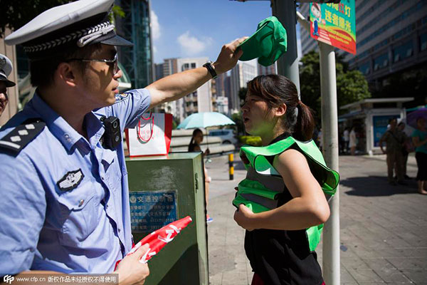 Green hats as punishment for traffic violations