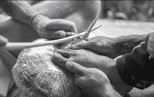 Indonesian tattooists revive tribal traditions