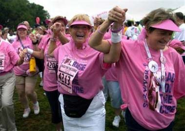 Breast Cancer Survivors take part in the opening ceremony of The Susan G. Komen Breast Cancer Foundation annual National Race for the Cure on Saturday, June 3, 2006, in Washington