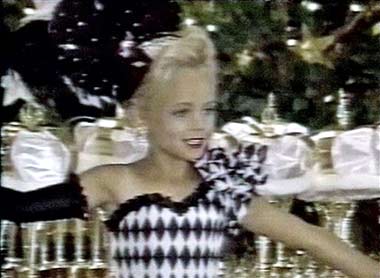 This image made from an undated family video shows JonBenet Ramsey performing during a beauty pageant. A former schoolteacher was arrested Wednesday, Aug. 16, 2006 in Thailand in the slaying of 6-year-old beauty queen Ramsey. Federal officials, speaking on condition of anonymity, identified the suspect as John Mark Karr, a 42-year-old American.
