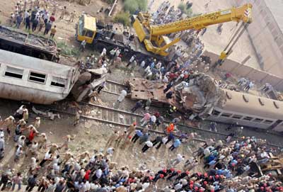 A view of the site of a train collision in Qalyoub, north of Cairo, August 21, 2006. Two Egyptian trains collided on Monday, killing up to 80 people and injuring twice that number in a Nile Delta town north of Cairo, a security source said.
