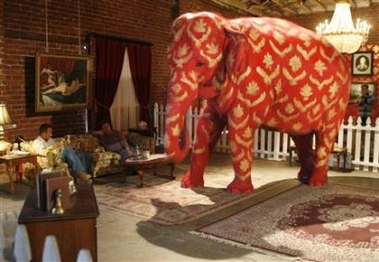Tai, a 38-year-old Asian elephant, which was painted by British underground artist Banksy is displayed at the 'Barely Legal' exhibition at a warehouse near downtown Los Angeles September 15, 2006.