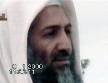In this picture taken from video and provided by The Sunday Times London, showing an man identified as Osama bin Laden, talking to followers in a video dated January 8, 2000. The video also shows September 11, 2001 suicide pilots Ziad Jarrah and Mohamed Atta, joking about making a will in a video dated January 18, 2000, more than a year before the 9/11 attacks in the United States. The Sunday Times said Sunday, Oct. 1, 2006, that the Jan. 18, 2000, video was made in Afghanistan for release after the men's deaths. The newspaper said it had obtained the video 'through a previously tested channel' but gave no further details, saying that sources from al-Qaida and the United States had confirmed the video's authenticity on condition of anonymity. (AP Photo/The Sunday Times