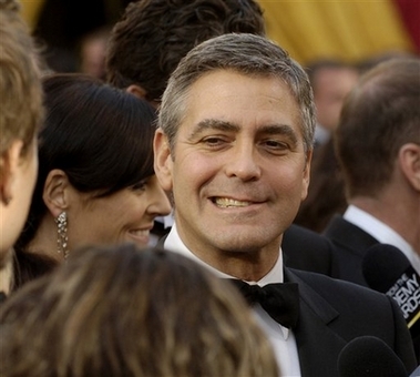 George Clooney arrives for the 78th Academy Awards in this March file photo in Los Angeles. (AP Photo/Chris Pizzello, FILE)