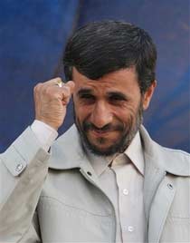 Iranian President Mahmoud Ahmadinejad clenches his fist during a public gathering in the city of Karaj, 21 miles (35 kilometers) west of the capital Tehran, Iran, Thursday, Sept. 28, 2006. A top European Union negotiator said Wednesday, Oct. 4, 2006 that 'endless hours' of talks with Iran about its nuclear program have failed to make any progress, while the Iranian president said U.N. sanctions would not stop Tehran from enriching uranium. (AP Photo