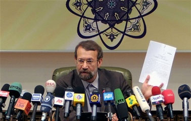 Iran's top nuclear negotiator Ali Larijani, who is also Iran's Sercretary of Supreme National Security Council, shown in Tehran, Iran, in an April 25, 2006 file photo. Iran has doubled its capacity to enrich uranium by successfully executing the process with a second network of centrifuges, a semiofficial news agency reported Friday, sending a defiant new message to the U.N. Security Council. (AP