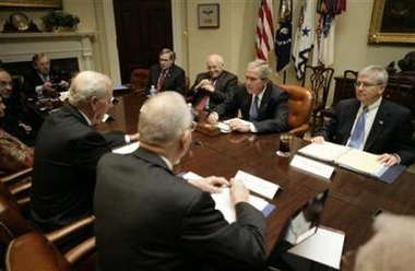 President George W. Bush at a meeting with the Baker-Hamilton Commission in the Roosevelt Room of the White House. The panel studying U.S. policy in Iraq has reached a consensus agreement and will release its conclusions on December 6.