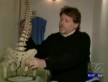 In this screengrab from CBS 2 New York, Dr. Brian Kessler, a back pain specialist, says he agrees with Scottish researchers. Kessler explains it's better to lean back somewhat in a chair because it takes pressure off your lower back. (Screengrab from CBS 2 New York)