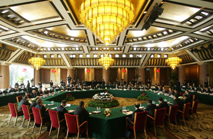 Six-party talks resume in Beijing with top envoys representing their respective countries seated around the table for discussions at the Diaoyutai State Guesthouse in Beijing December 18, 2006. 