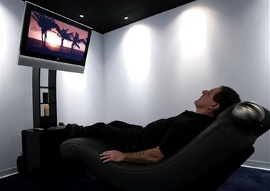 Engineer Mark Ekenbarger stretches out in the nap room at Yarde Metals, Inc.'s headquarters in Southington, Conn., Thursday, Feb. 8, 2007.
