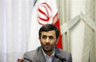 Iran's President Mahmoud Ahmadinejad attends a news conference in Tehran, February 18, 2007. 