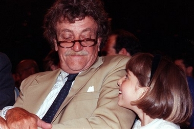 Governor's Arts Award winning author Kurt Vonnegut glances down at his daughter Lilly,7, in this file photo from June 29, 1990, during the New York State Governor's Arts Awards ceremony at the Metropolitan Museum of Art. Kurt Vonnegut's wife, Jill Krementz says the satirical novelist of works such as 'Slaughterhouse-Five' and 'Cat's Cradle' has died Wednesday Aprill 11, 2007 at age 84 in Manhattan.(AP