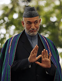 Afghanistan's President Hamid Karzai gestures at a news conference in Kabul May 17, 2007. 