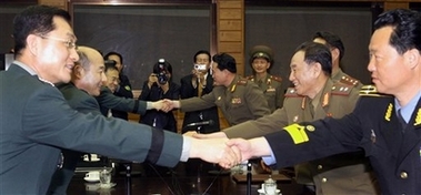 Koreas adopt military agreement