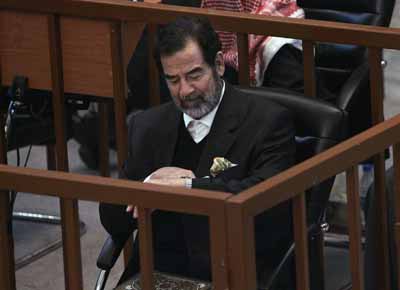 Saddam stands on trial