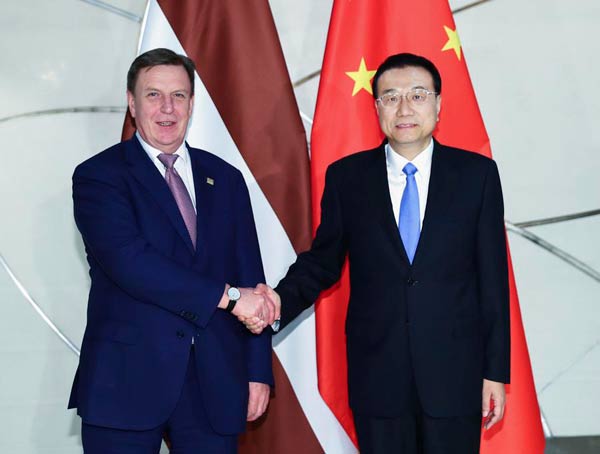China, Latvia pledge to advance cooperation