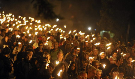 Torch procession commemorates L'Aquila quake
