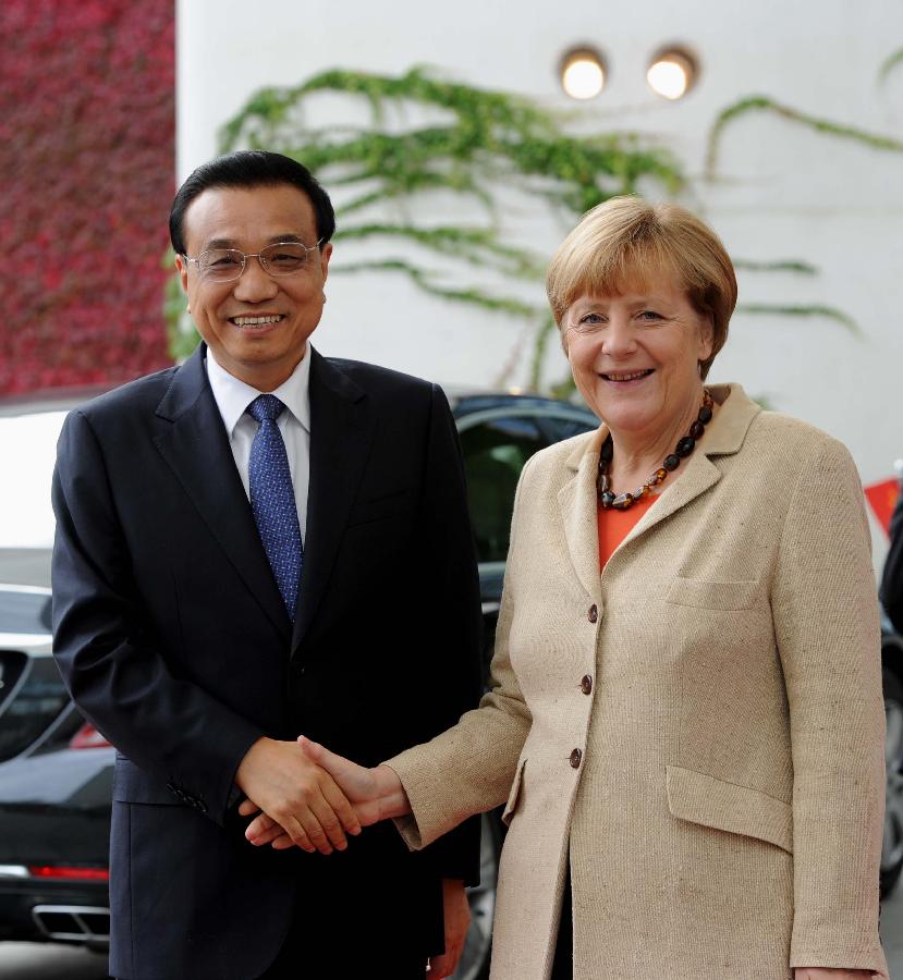 Chinese premier attends welcoming ceremony held by Merkel