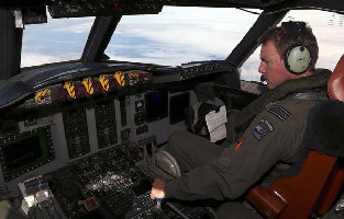 Australia launches coordination center for searching MH370