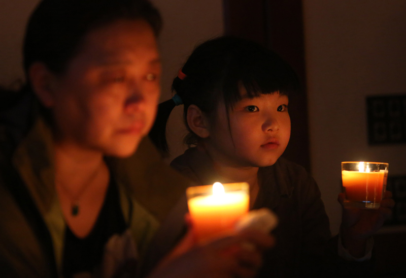 Vigil marks one month since MH370 vanished