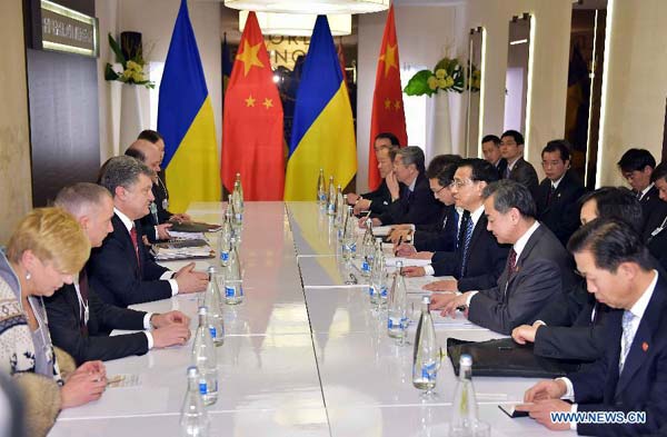 Premier Li meets Ukrainian, Serbian and Kazakh leaders in Davos