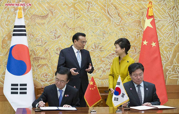 Deals inked as Chinese premier starts visit to South Korea