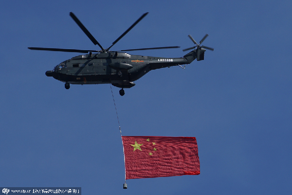Space technology unfurled in red flag over Tian'anmen