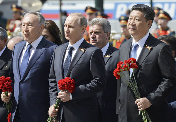 Xi attends Russia's V-Day parade, marking shared victory with Putin