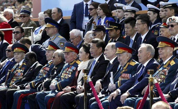 Xi attends Russia's V-Day parade, marking shared victory with Putin