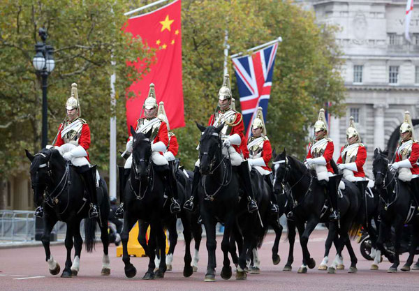 Xi leaves for visit to Britain