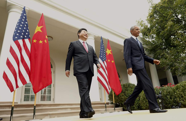 Xi, Obama take aim at cybertheft