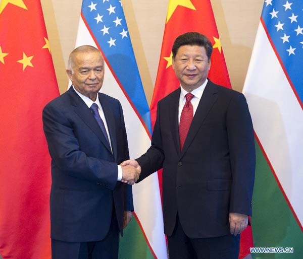 President Xi meets Uzbekistan president on ties